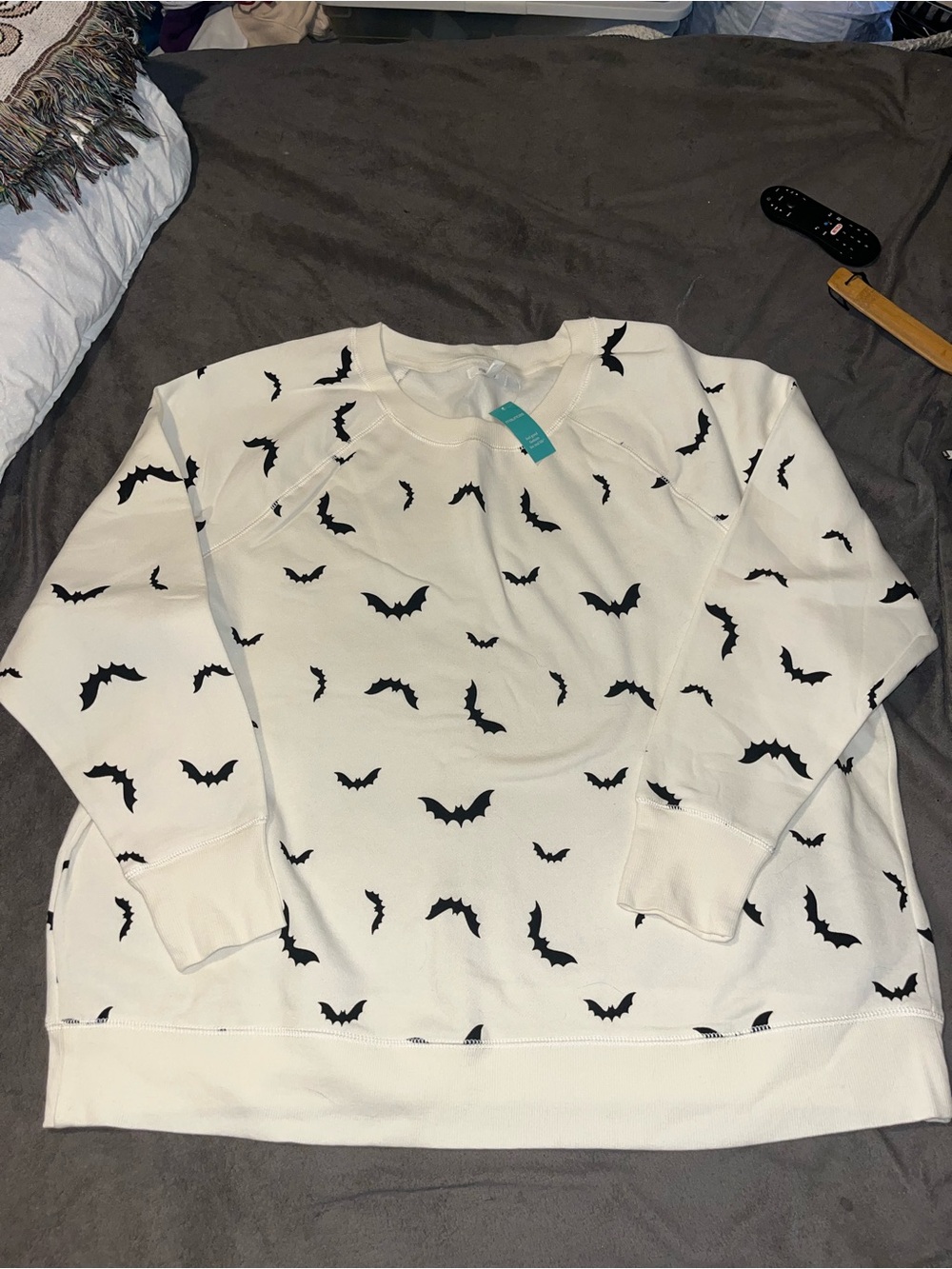 Maurices Cream Sweatshirt with Black Bat Print
